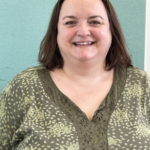 Portrait of Lisa Hartwell, the South Western Synod's new Pastoral Advisor, smiling at the camera.